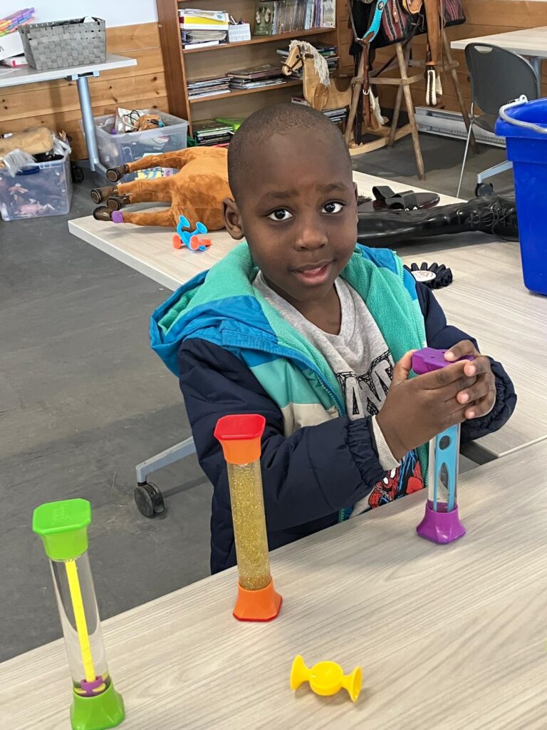 Child enjoying his craft activity