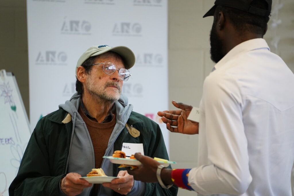 Two volunteers having a discussion.